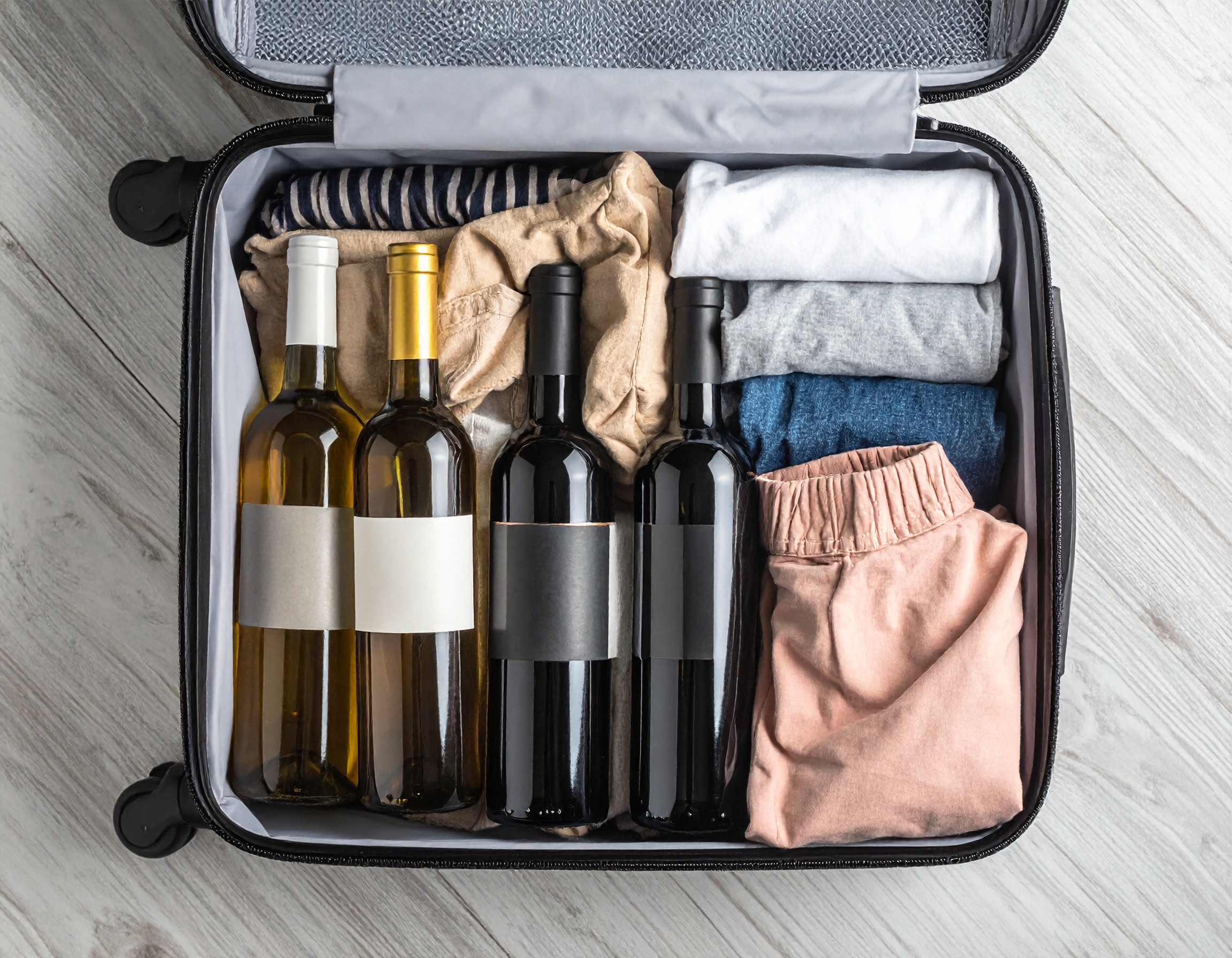 Limite de bebidas no avião – mala de mão e despachada