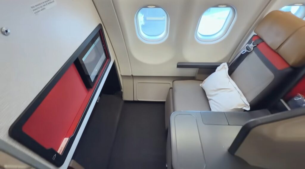 Voei na executiva da South African pagando menos que a econômica